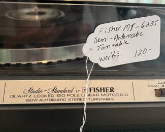T81 - $120. Fisher Quartz Semi Automatic Stereo Turntable Model MT - 6335. Powers on and turns.