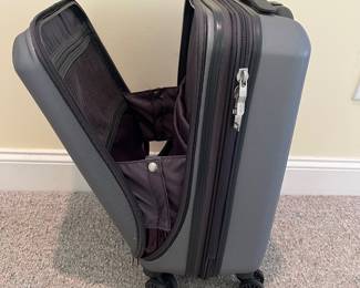 T88 - $55. Delsey Paris Carry On. Measures 22” tall.