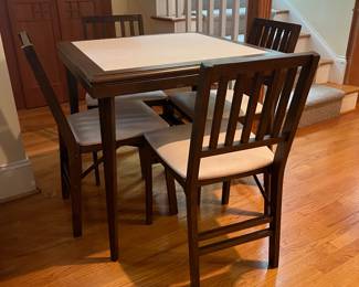 T37 - $125. Stakmore Company Midcentury Folding Bridge Table with 4 folding chairs. Wood frame with Vinyl top and seats. Table measures - 30.5" x 30.5" x 29" Tall. Chairs measure - 16.5" x 19" x 32" tall, floor to seat 17.75". Excellent condition.