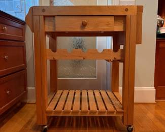 T2 - $150. Butcher Block Rolling Island. Measures 32.25" x 23" x 36" tall. Single drawer slides easily, holes for knives. Overall very good condition.