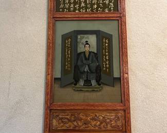 T93 - $750. PAIR of Chinese Ancestor Reverse Paintings on glass with intricately carved wood frame and brass hanging plates. Each Measures 21.75" x 41.5"T. Very good condition.