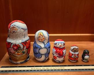 T73 - $30. Russian Christmas Nesting Dolls Matryoshka Santa Claus Snowman 5-pc Signed Set. Measures 5” tall.