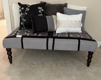 T51 - $20. Safavieh Upholstered Bench with Wood Legs. Measures 47" x 26.5" x 15.5" tall. Upholstery has some staining and legs are wobbly.
