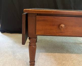 T44 - $60. Wooden Coffee Table with Drop Leaf Sides and 1 drawer. Measures 30" (45" expanded) x 24" x 17" Tall. Very good condition with some surface wear, mainly on legs.