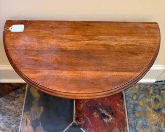 T21 - $25. Small Demilune Table. Measures 21.75" x 11" x 22.25" tall. Needs minor repairs, wiggles a little.