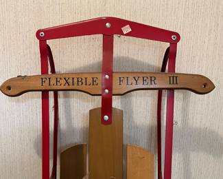 T134 - $65. Flexible Flyer III Wooden Snow Sled. Measures approximately 53” long.