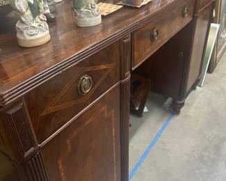 Pedestal form sideboard