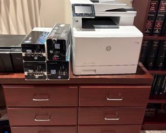 HP Printer in great condition, additional ink cartridges and desk available.