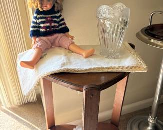 Vintage Shirley Temple doll, Oneida vase, lace doilies and heart shaped side table