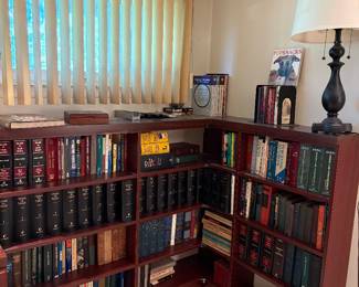 Complete set of law encyclopedias and book cases.