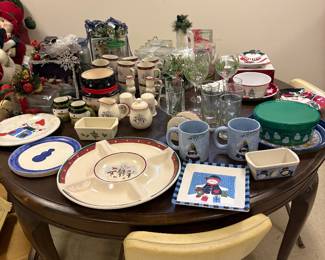 Lots of Christmas dishes, coffee mugs, serving plates, light up glass decorations and more!