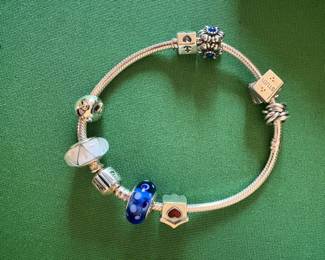 Beautiful Pandora bracelet with several bible study charms
