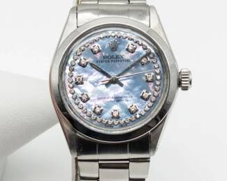 Yacht auction MOP ROLEX front