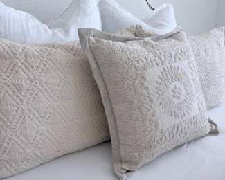 Set of beige textured throw pillows. $45