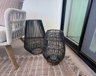 Pair of black woven decorative floor lanterns. $75