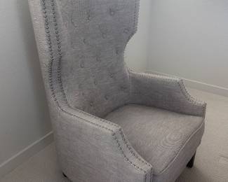 Light gray tufted armchair with nailhead trim (additional view). $160