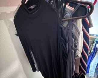 Part of the 75+ piece clothing bundle (black long-sleeve top shown). $175 for all