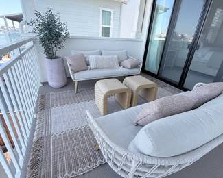 Patio vignette — loveseat, chairs, rug and planters priced individually (see photos 9–12).