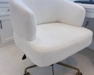 White bouclé swivel office chair with brass-tone base (additional view). $175