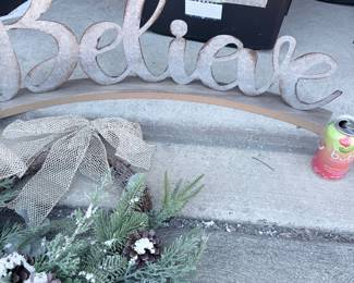 Part of the designer holiday bundle — large "Believe" wood sign + greenery swag (photos 41, 42, 44, 46, 47). $75 for the whole bundle