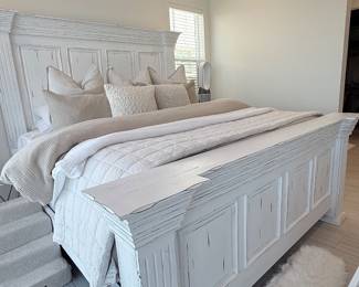 White paneled bed with tall headboard. $400