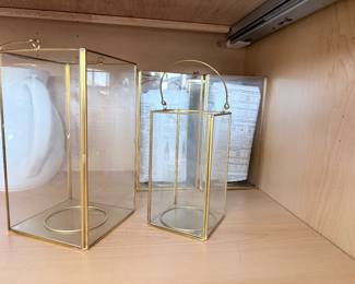 Pair of modern gold-frame glass lantern candle holders. $25
