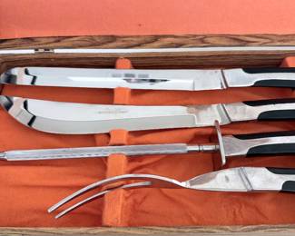 Stainless carving set with wooden storage case. $45