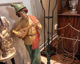 large painted minstrel statue, metal plant & magazine stands