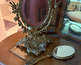 ornate cast metal dresser mirror