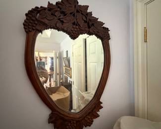 antique carved wood mirror in heart shape