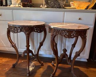 antique carved wood round tables w/ brown marble tops (2)