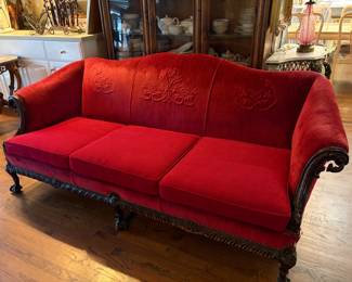 vintage carved sofa with red velvet embossed upholstery