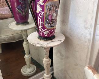 antique porcelain scenic vase on marble pedestal