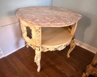 pink marble topped round table