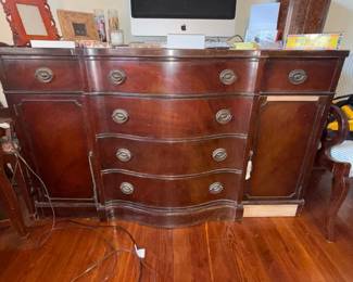 Vintage Drexel Serpentine-Front Mahogany Sideboard / Buffet.  Traditional sideboard with serpentine-front drawers, flanking cabinet storage and brass-tone bail pulls. Beautiful restoration/refinishing piece. Some veneer loss; original missing veneer pieces are included for repair.