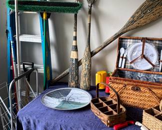 Decorative oars, picnic basket, silverware baskets, Grill lighters, 8’ step ladder, roof rake and push broom.