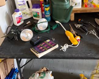 Garden and lawn chemicals, watering cans and spotlights.