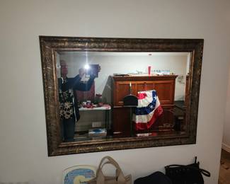 Large, heavy, beveled-glass mirror