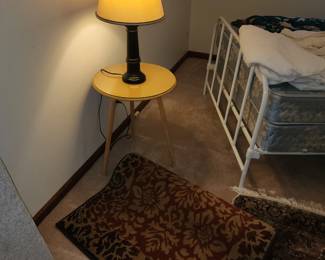 Rug, lamp, round table