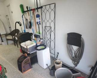 dehumidifier, small dog supplies, brand new 32 gal garbage can on wheels, hose, cleaning tools
