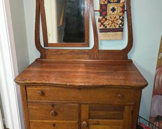 Antique, refinished, washstand with wishbone, mirror and towel rod. $200. The top drawer needs repair. Otherwise, everything is in great condition, considering its age Was from the Kankakee Hotel 64"w x 36"h x 19"d