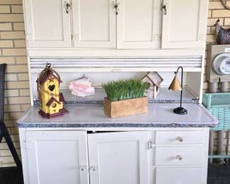 Antique Hoosier Cabinet This is such a charming piece. And in such great shape! One of the cabinet doors needs to be secured. 48"w x 66"h x 26"d $259