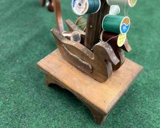 Wooden duck thread storage 