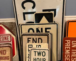 Road closed, reserve parking, one way signs