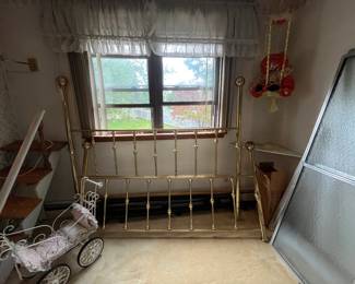 Brass bed and creepy clown