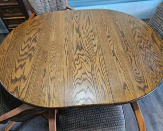 Oak Pedestal Dining Set with Swivel Chairs second image