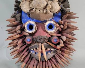 Lot 329  Vintage African mixed media ceremonial mask