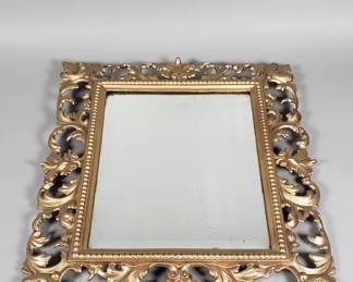 Lot 195  Vintage cast iron gilt mirror