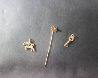 004  Lot 166  14k gold stick pin with diamond, key pendant and