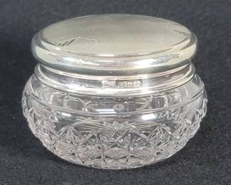 Lot 417  Vintage cut crystal jar with silver hallmarked lid